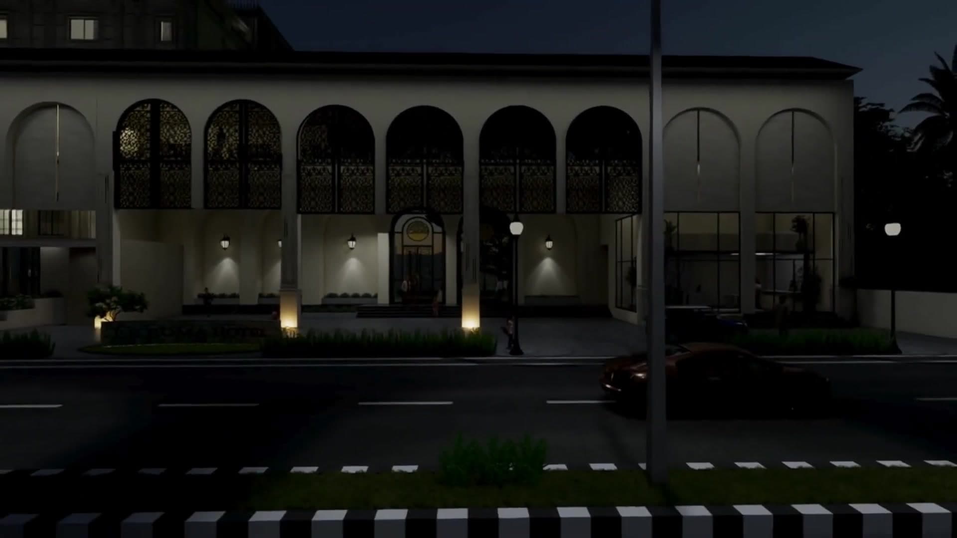 Night facade of Le Roma Grandeur with warm ambient lighting